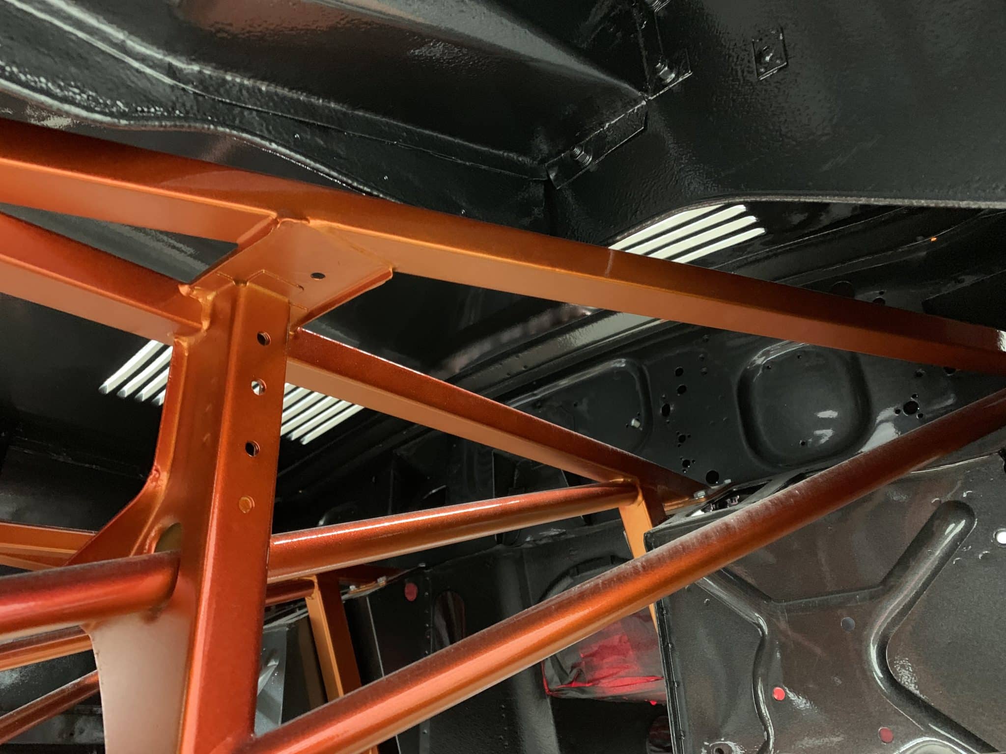 031019 Jaguar E Type Race Car underneath Raptor 3 1
