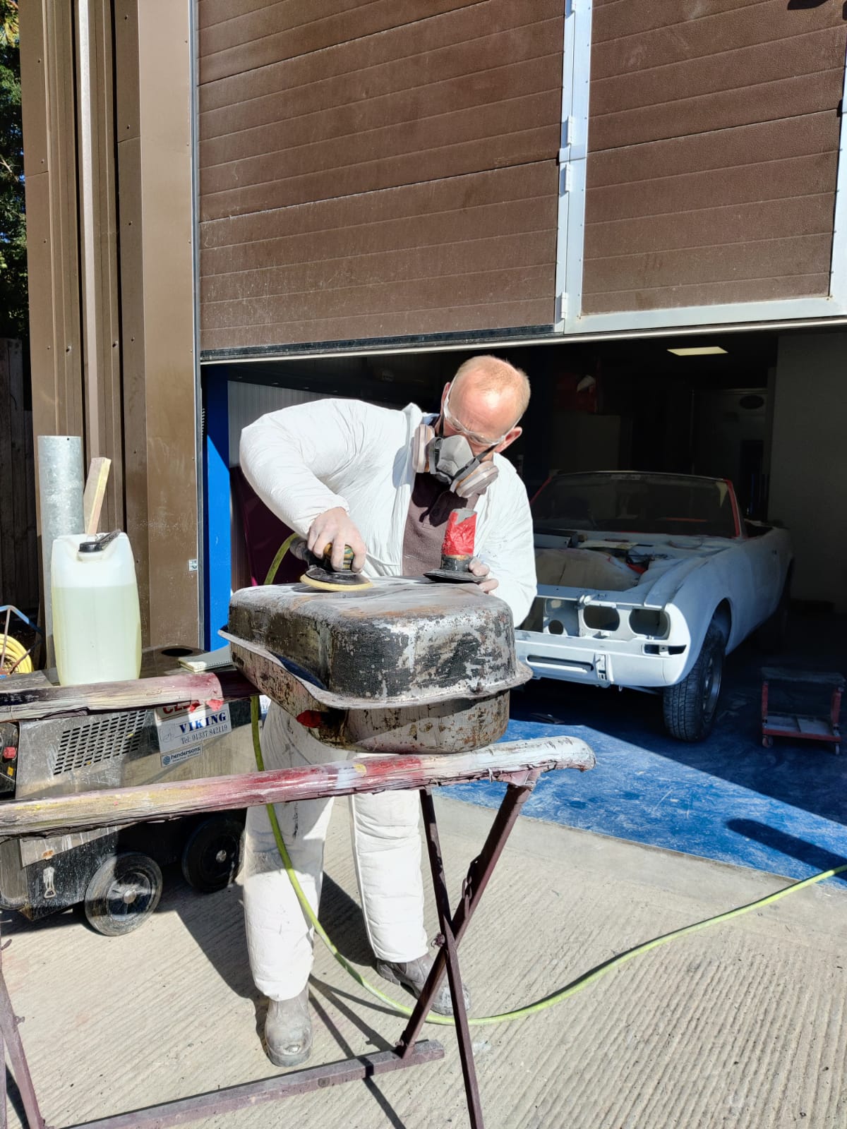Sanding Peugeot 504 fuel tank Darren Paintshop 1