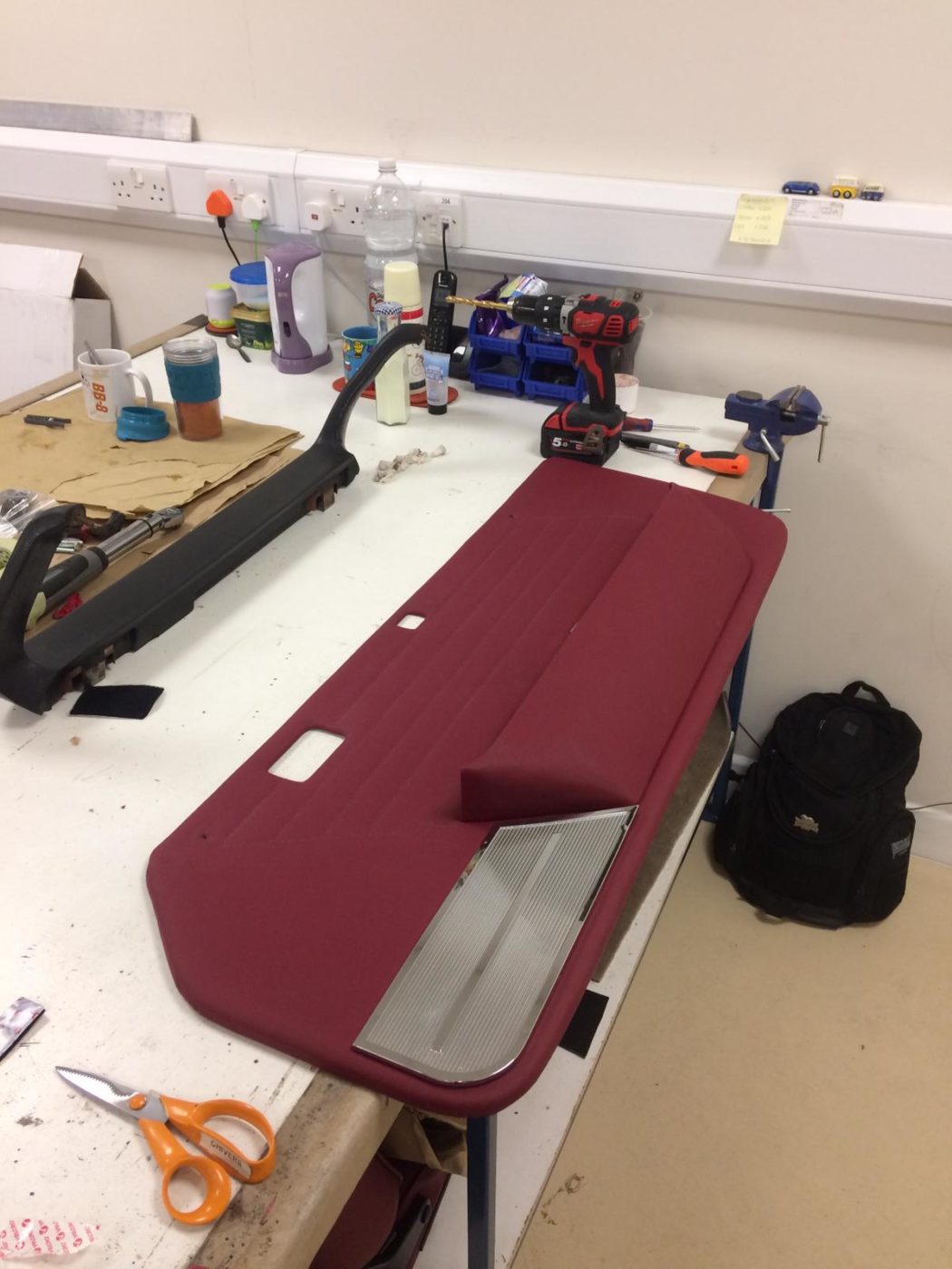 Peugeot fitting chrome to door pannels 1