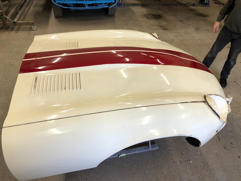 31.03.2021 1973 White Jaguar E Type bonnet stripped and bumper welded 2 1