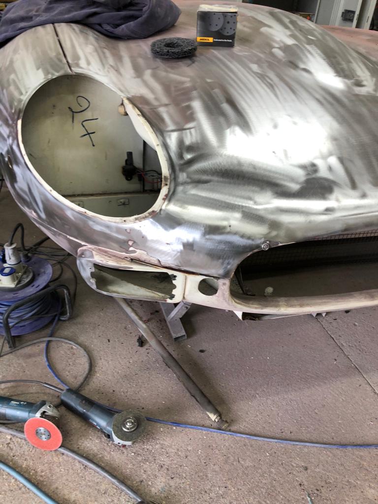 31.03.2021 1973 White Jaguar E Type bonnet stripped and bumper welded 21 1