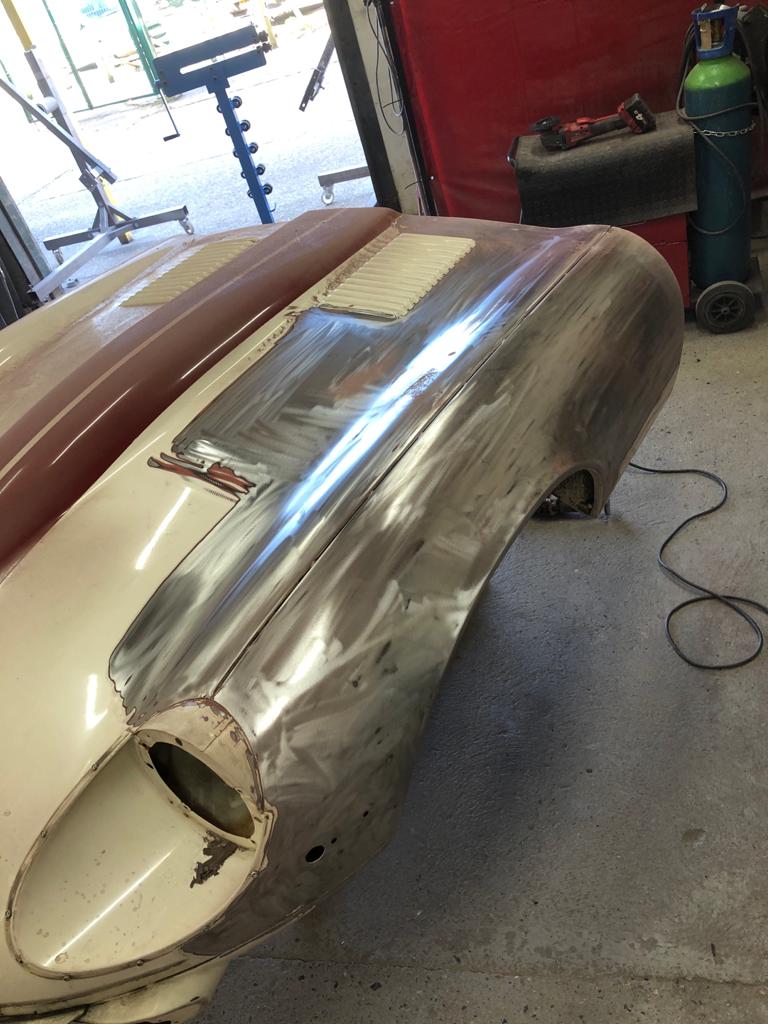 31.03.2021 1973 White Jaguar E Type bonnet stripped and bumper welded 5 1