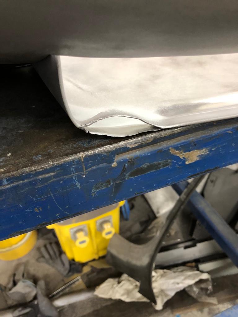 26052021 White jaguar etype roadster inconsistencies in the front over riders that needed addressing to obtain symmetry and leading the spot welded joints on the shell 35 1