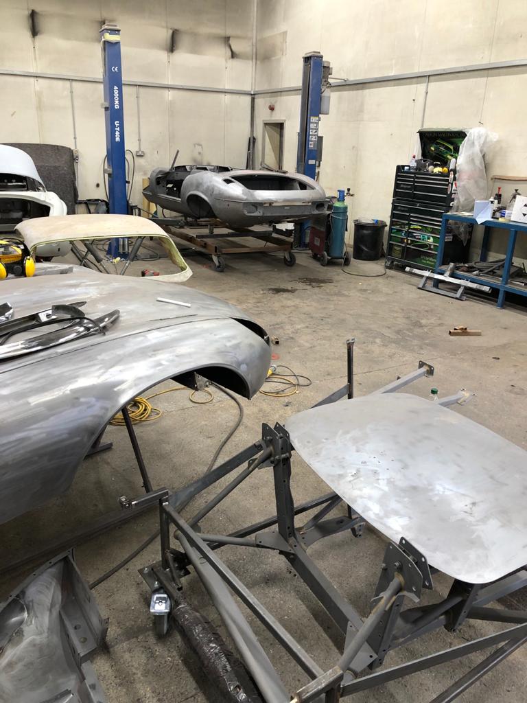 26052021 White jaguar etype roadster inconsistencies in the front over riders that needed addressing to obtain symmetry and leading the spot welded joints on the shell 39 1
