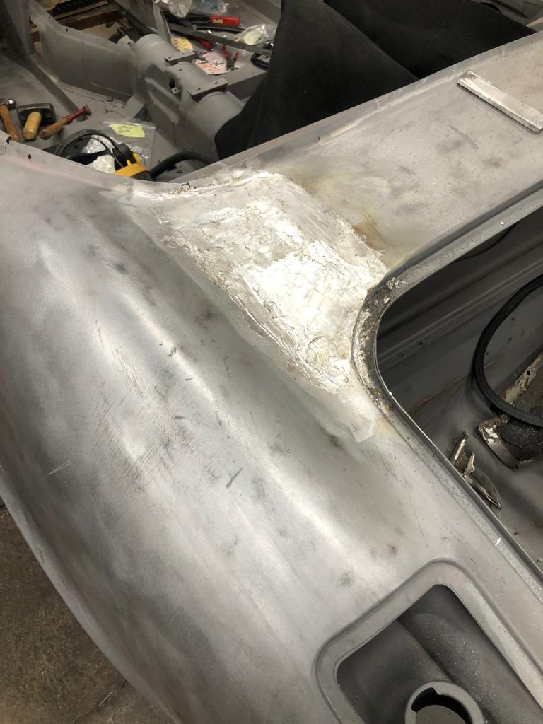 26052021 White jaguar etype roadster inconsistencies in the front over riders that needed addressing to obtain symmetry and leading the spot welded joints on the shell 41 1