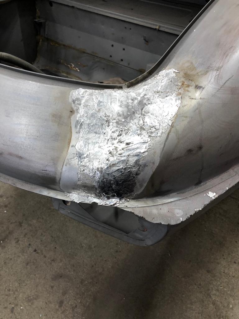 26052021 White jaguar etype roadster inconsistencies in the front over riders that needed addressing to obtain symmetry and leading the spot welded joints on the shell 45 1