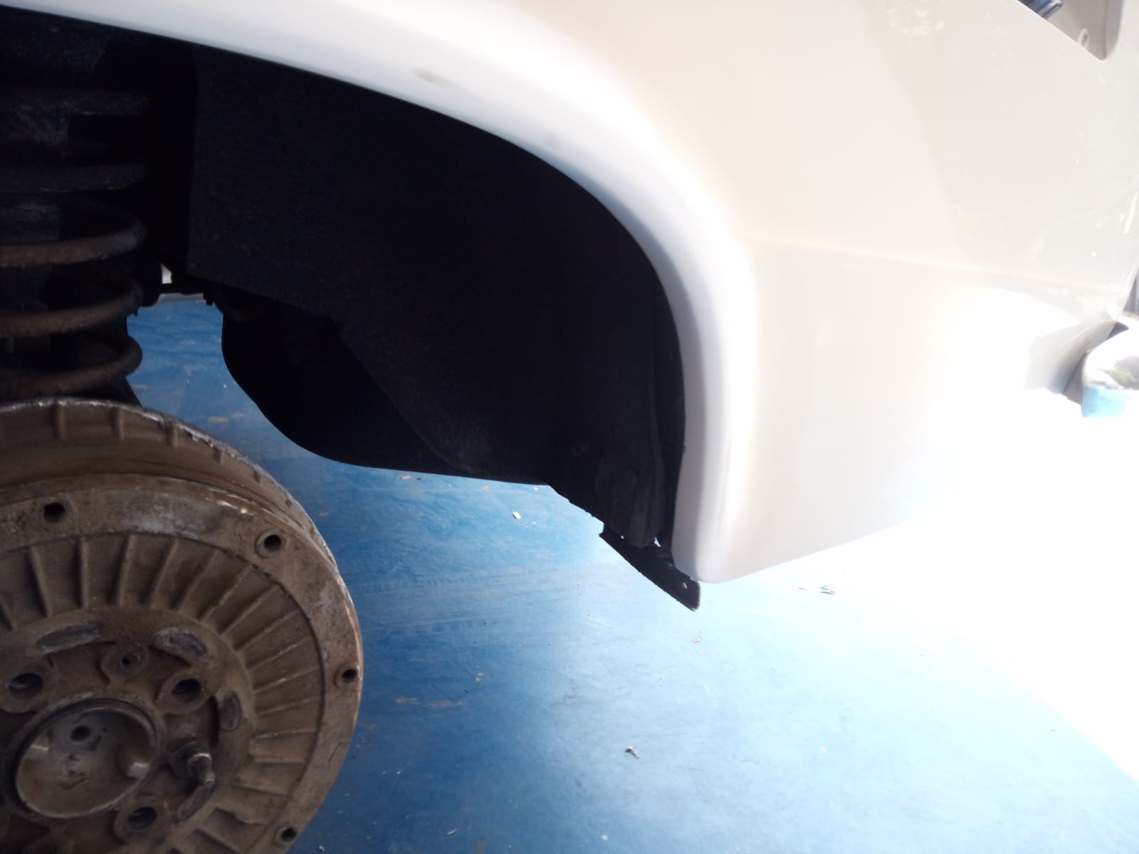 03062021 Lada rear wheel arch damaged from loosing rear wheel whilst driving repaired primed and painted 1 1