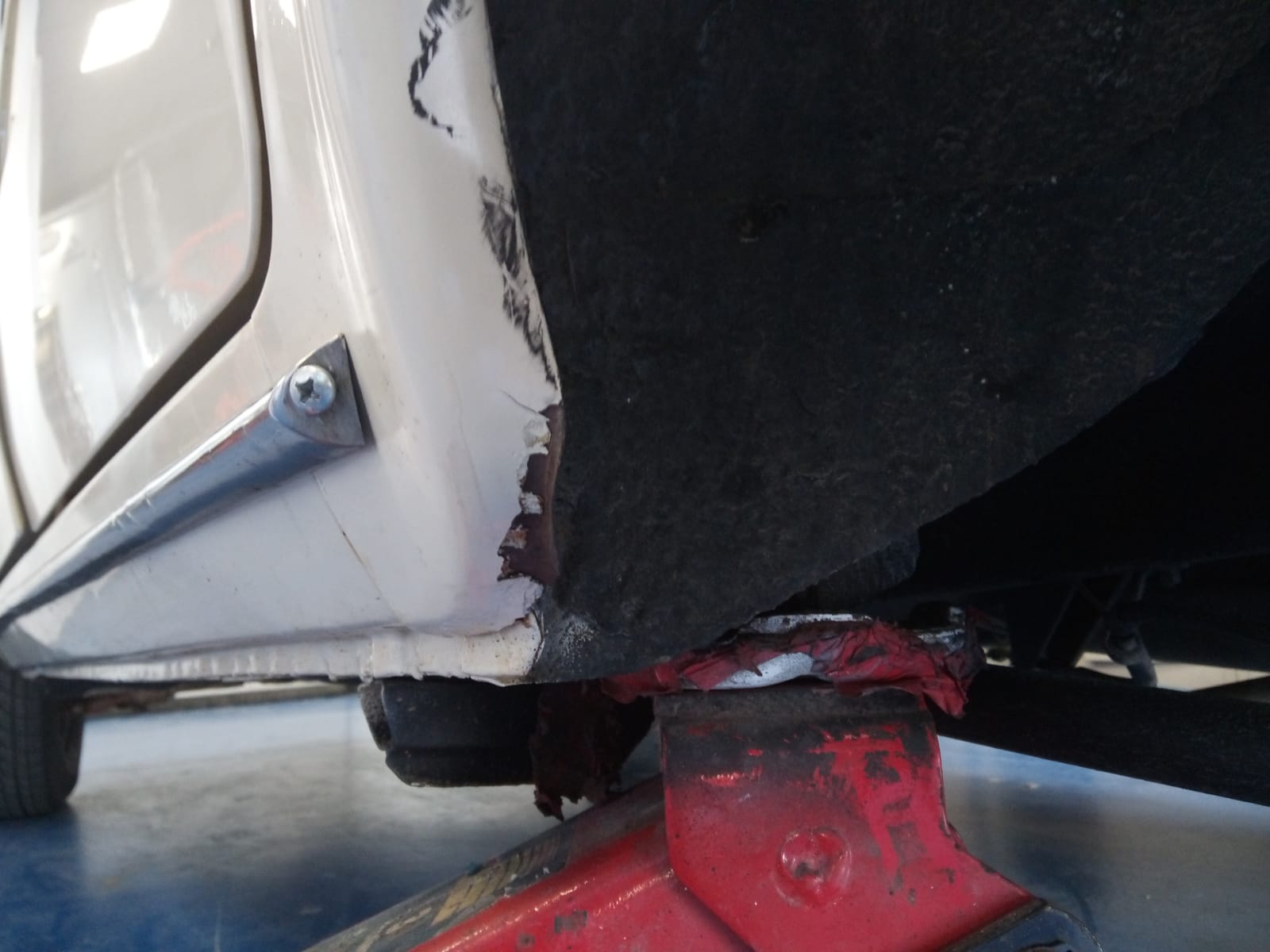 03062021 Lada rear wheel arch damaged from loosing rear wheel whilst driving repaired primed and painted 2 1