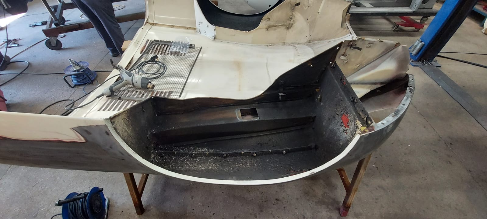 03062021 White etype bonnet rubbed and primed. wheel arch sttripped and undersealed 10 1