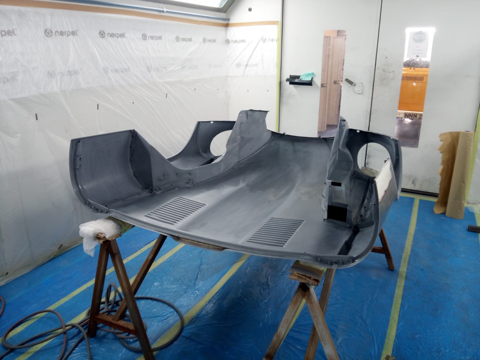 14062021 White Jag e type bonnet stripped down and in epoxy primer 1