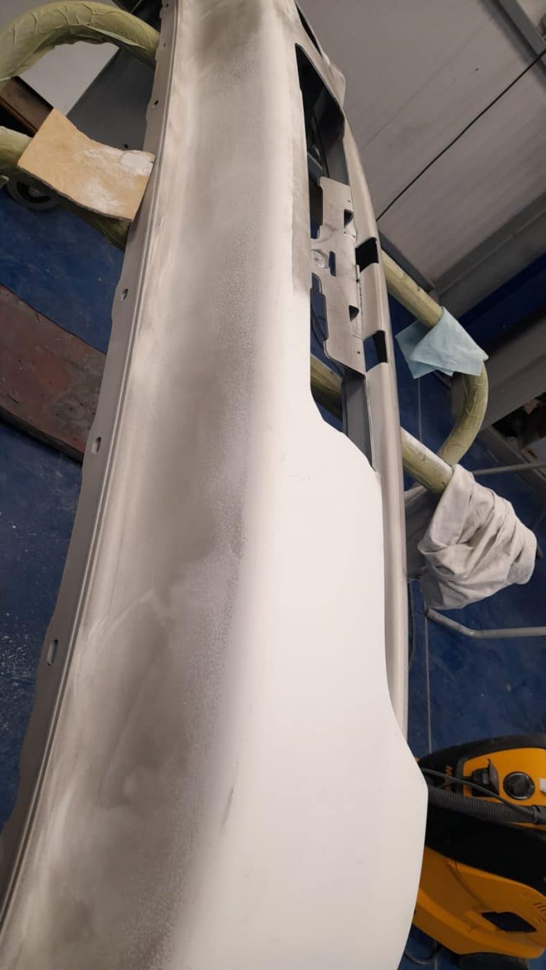Honda Integra pannels being sanded after priming 12 1