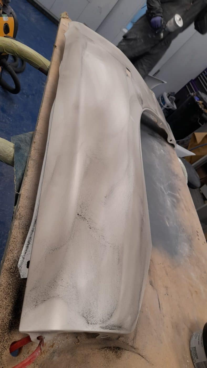 Honda Integra pannels being sanded after priming 15 1