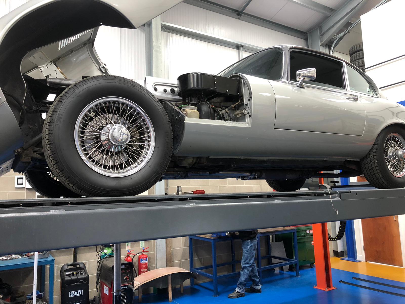 Jaguar E Type Draining the oil as part of service 1