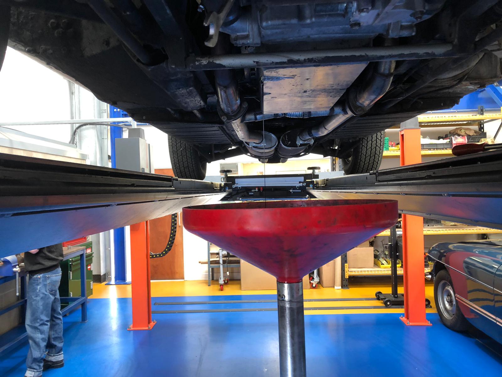 Jaguar E Type Draining the oil as part of service 2 1