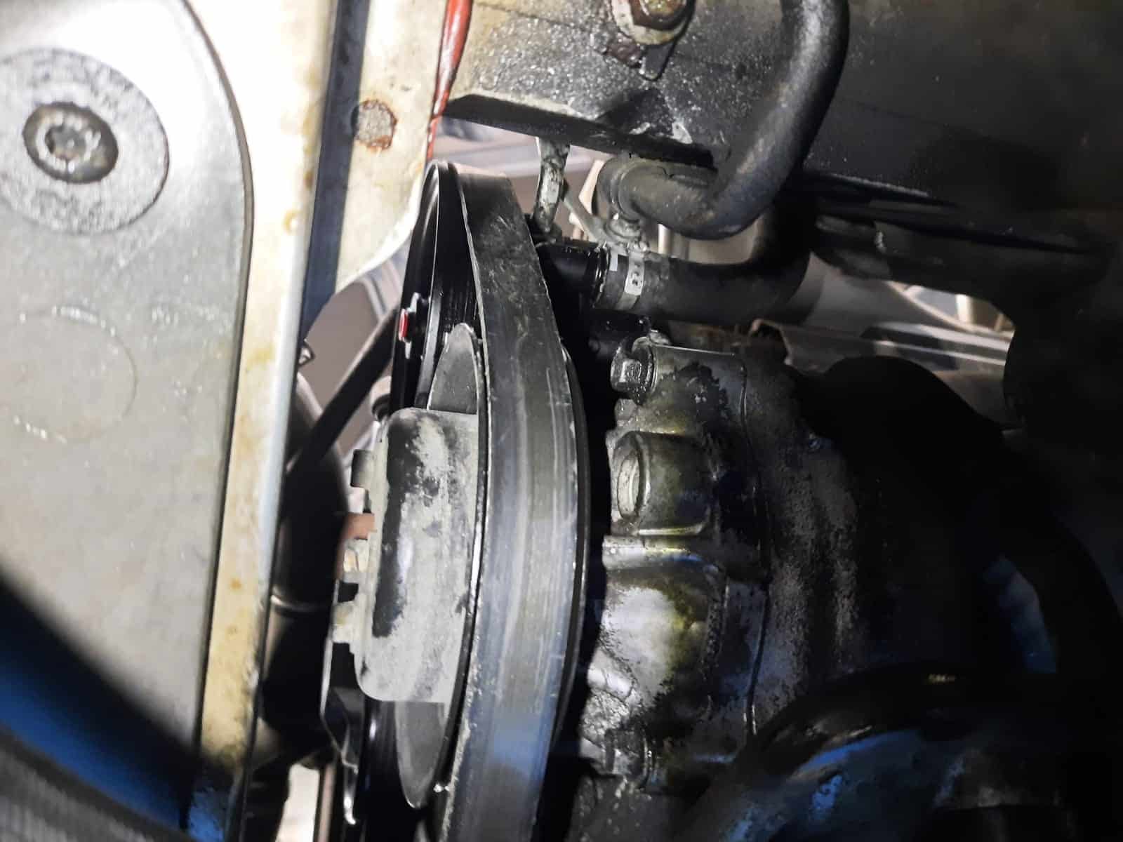 051121 Aston Martin DB9 fitting the power steering pump 27 1