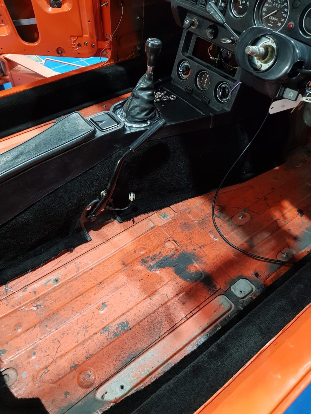 220922 MG B GT Blaze carpet and trim going in 3 1