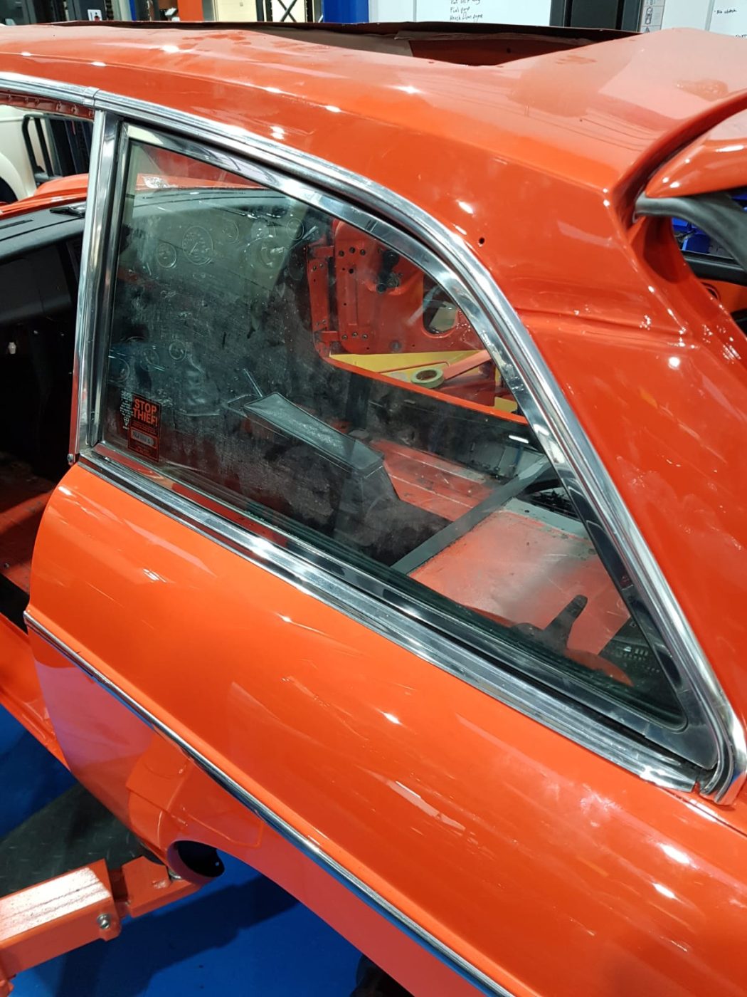 220922 MG B GT Blaze carpet and trim going in 4 1