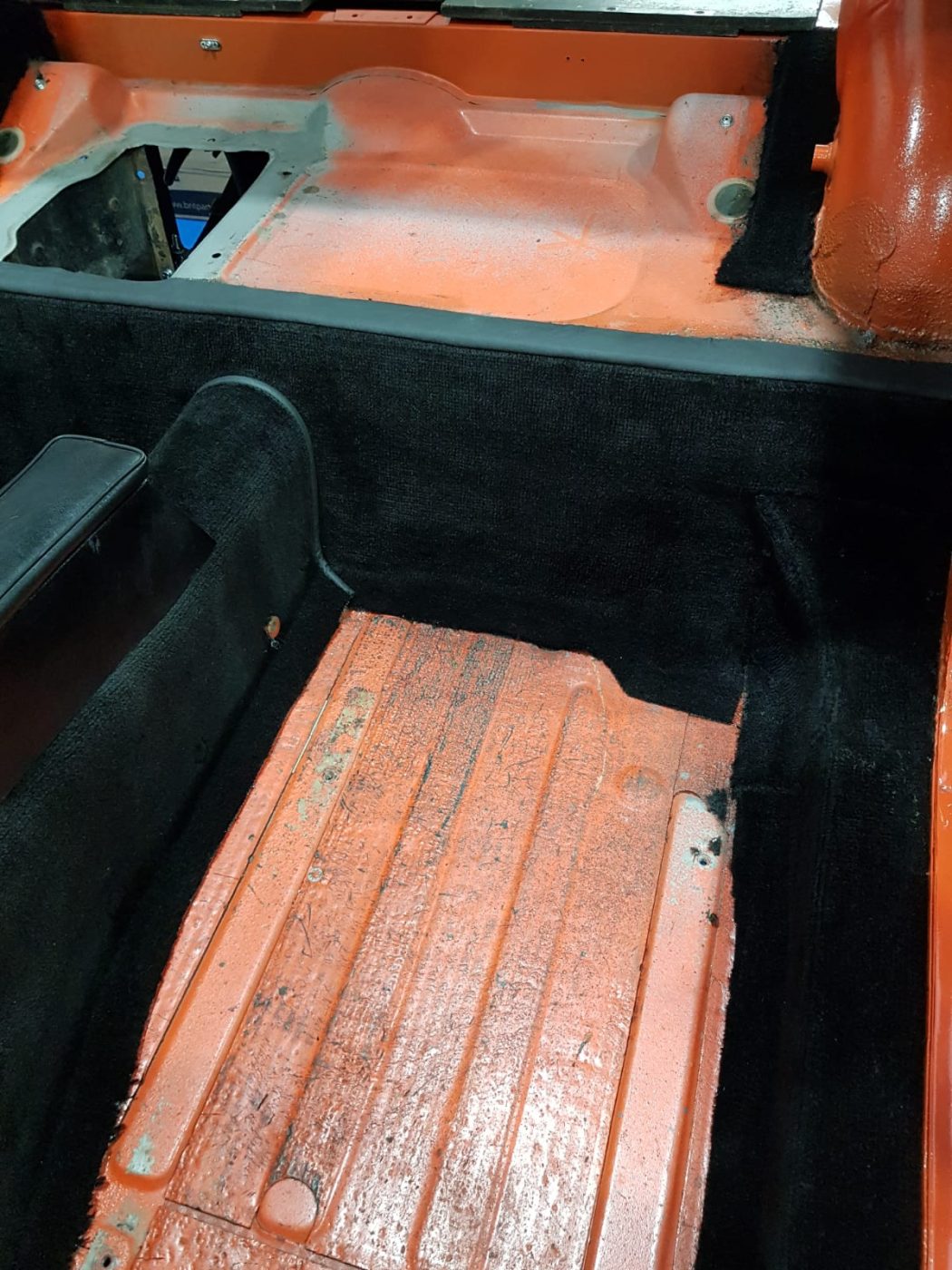 220922 MG B GT Blaze carpet and trim going in 6 1