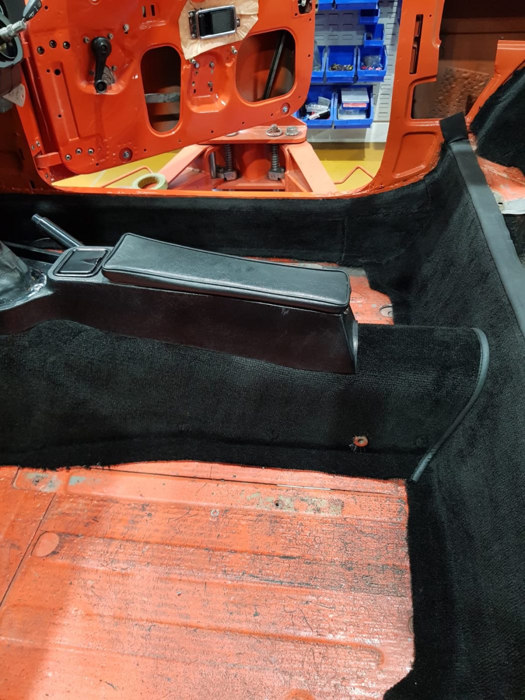 220922 MG B GT Blaze carpet and trim going in 7 1