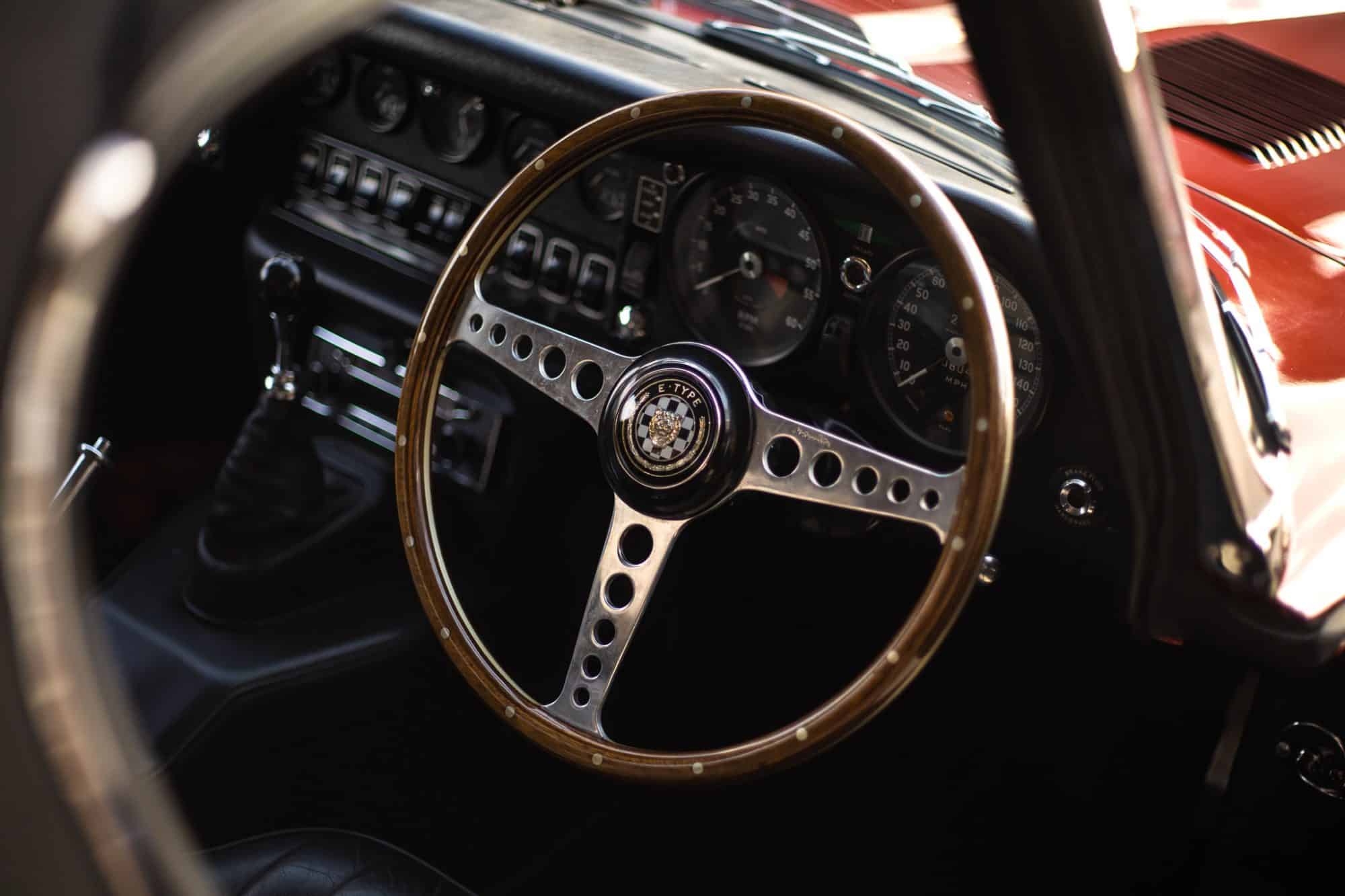 07042021 Maroon Jag E Type leaving 12