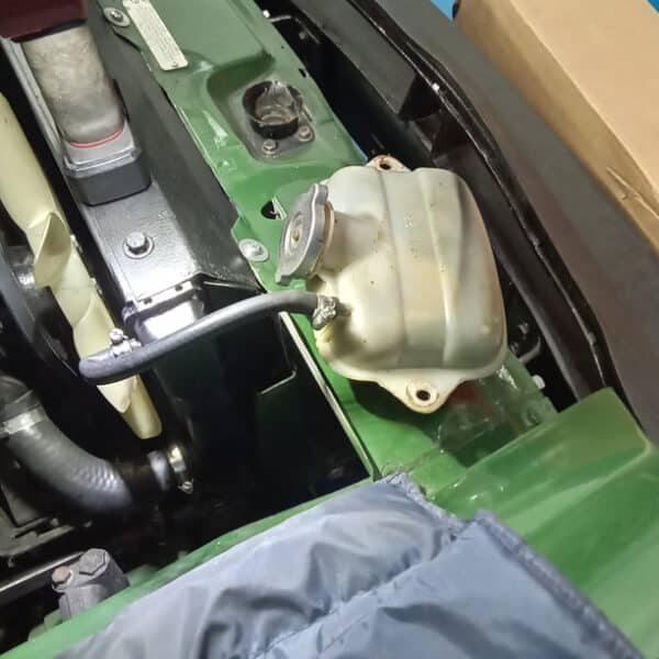05.06.2025 1978 MG Midget 1500 Green Header Tank 1