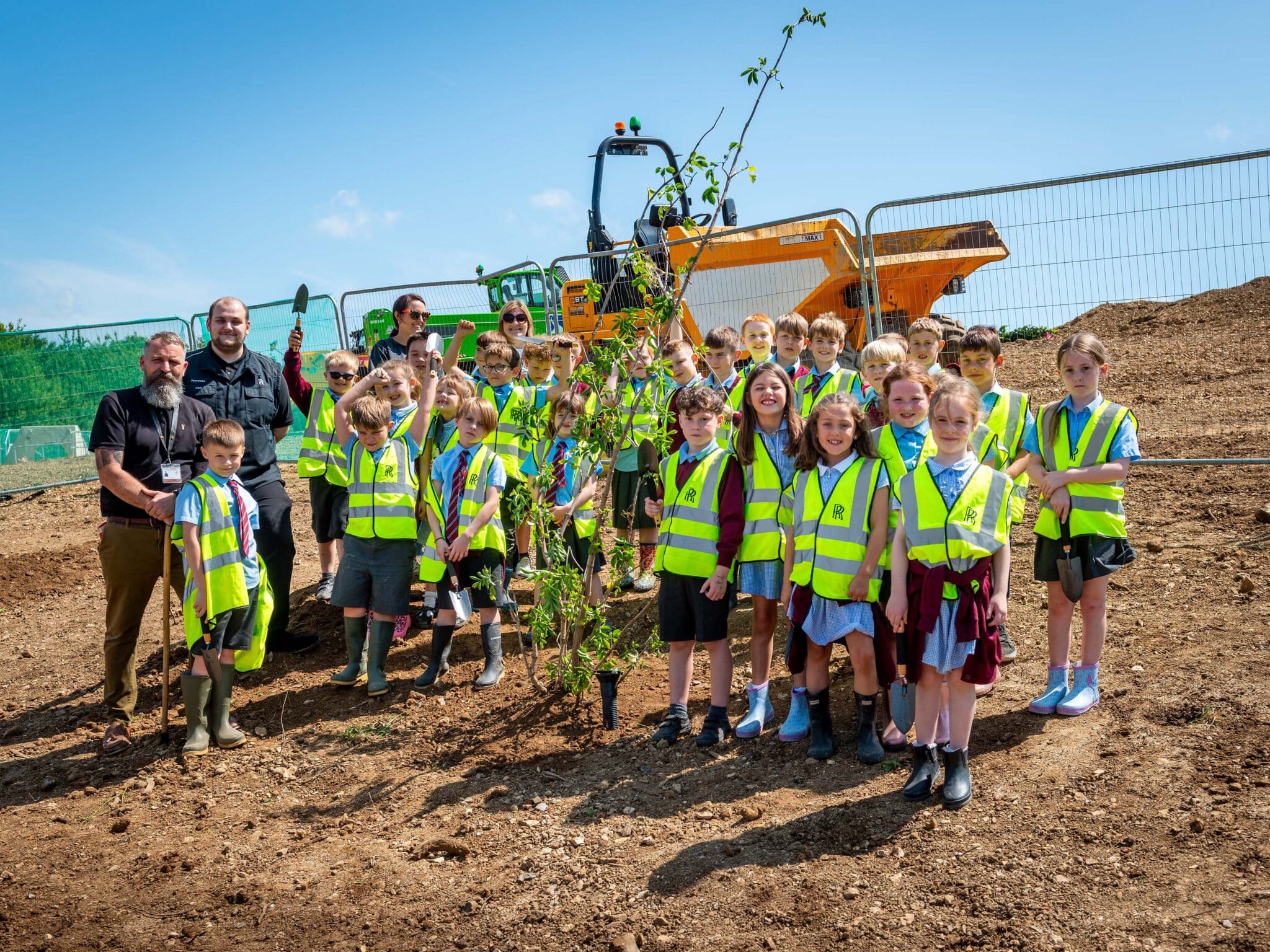 Local schoolchildren plant first new tree on Rolls Royce extension site 1 scaled