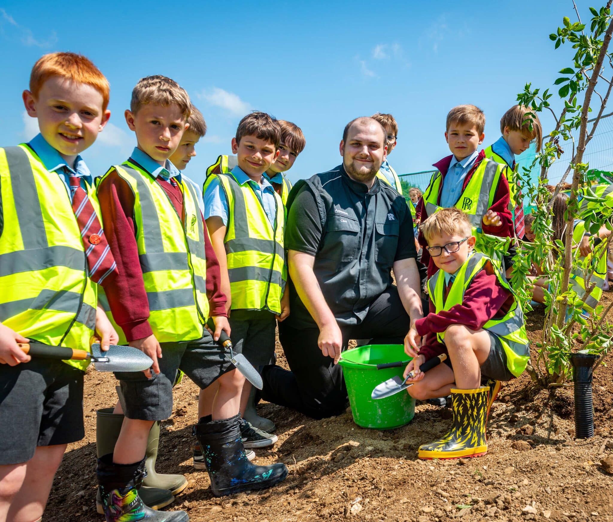 Local schoolchildren plant first new tree on Rolls Royce extension site 2 scaled