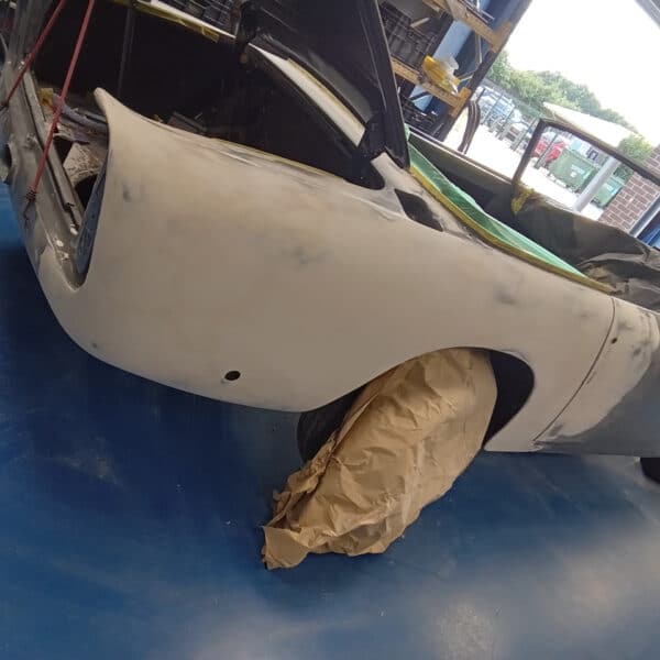 08.07.2025 1969 Aston Martin DB6 Volante Blue rear quarter boot filler 9