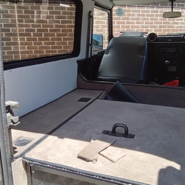 14072025 2010 Land Rover Defender 110 rear carpet 1