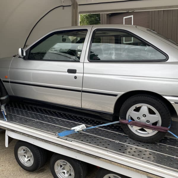 07.08.2025 1993 Ford Escort XR3I Silver transport 2