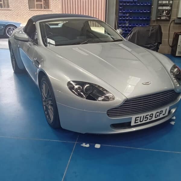 07.08.2025 2009 Aston Martin AMV8 Vantage Convertible Silver PDI 1