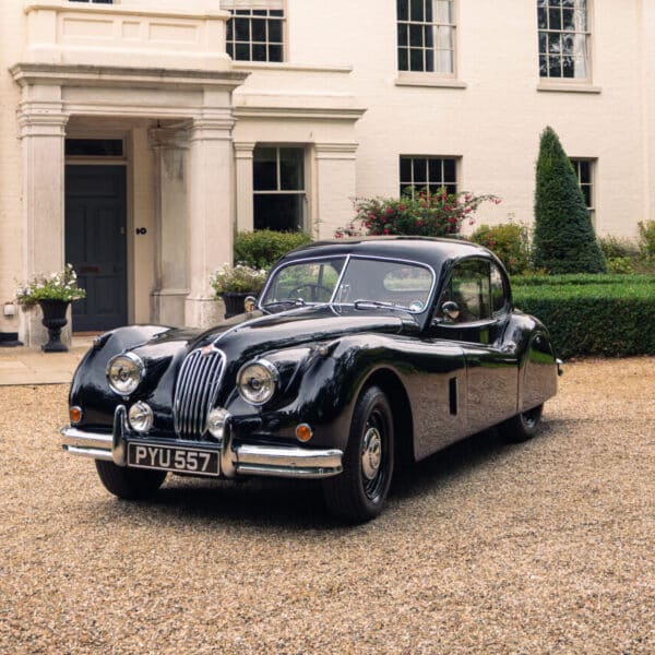 1955 Jaguar XK140 or £25,000