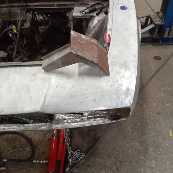 071125 1970 Aston Martin DBS Left Headlight Bezel