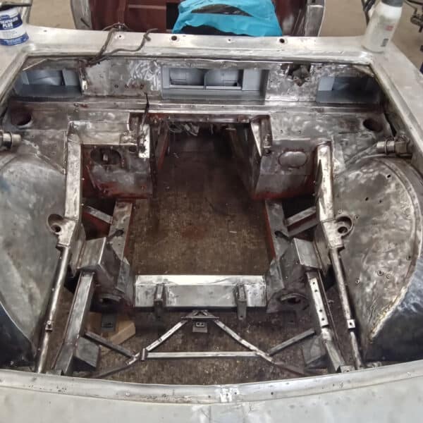 091225 1970 Aston Martin DBS Engine Bay Rust Encapsulator