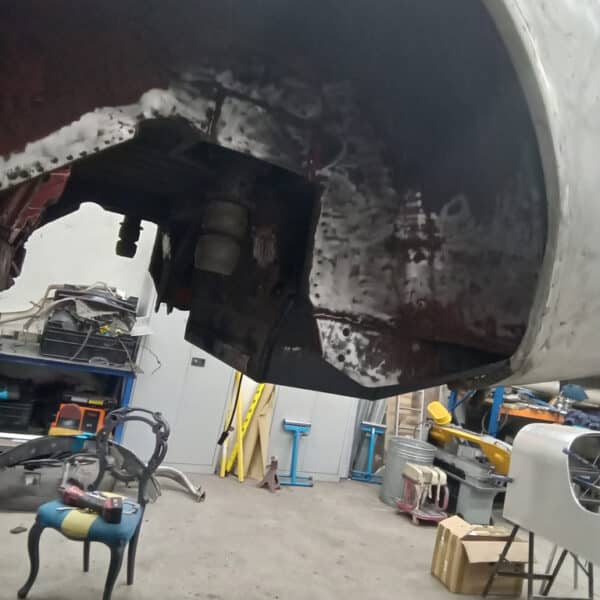 091225 1970 Aston Martin DBS Removing Underguard 3