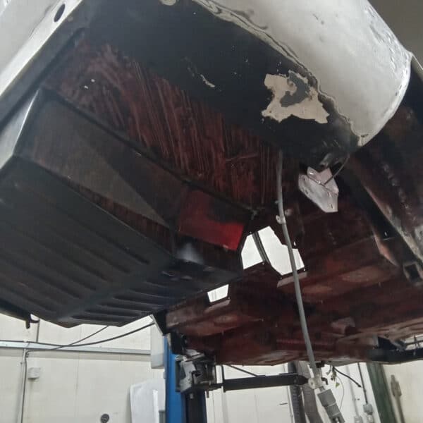 101225 1970 Aston Martin DBS Removing Underguard 7