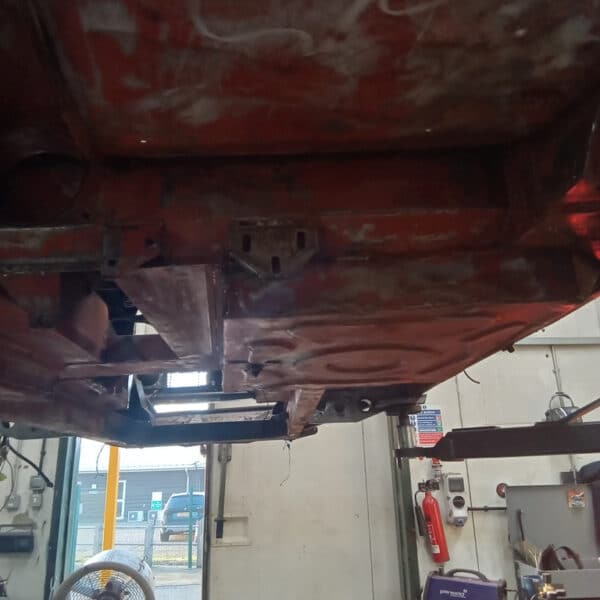 111225 1970 Aston Martin DBS Removing Underguard 12