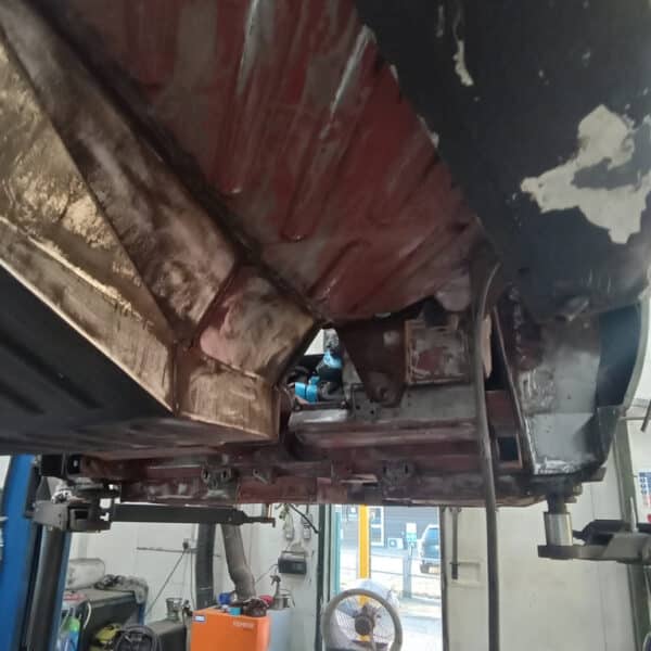 111225 1970 Aston Martin DBS Removing Underguard 14