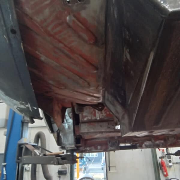 111225 1970 Aston Martin DBS Removing Underguard 15