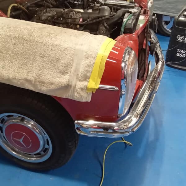 261125 1973 Mercedes 250 New Bumpers Exhaust and Intake Manifods Chrome Bashbar