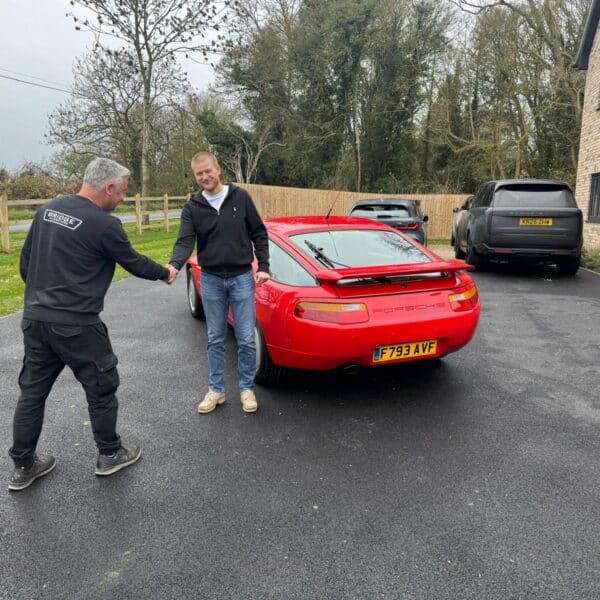 291125 Oliver Goddard accepting his Porsche 928 3