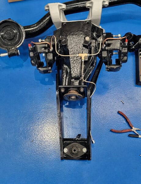 260226 1970 Aston Martin DBS New Brake Lines on the Diff