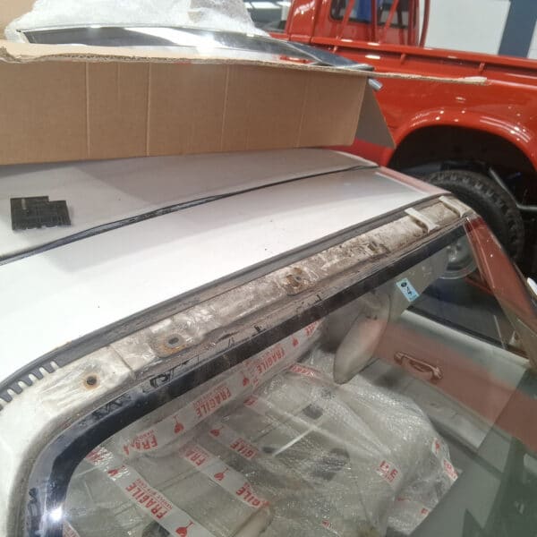 260326 1991 Nissan Figaro Windscreen trims wheel arch and door cards removed 14