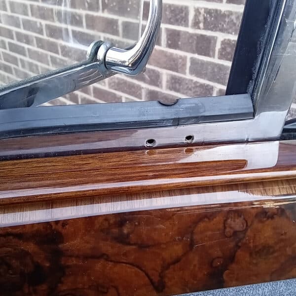 230426 1959 Jaguar MkIX OF Quarter Window Striker 11