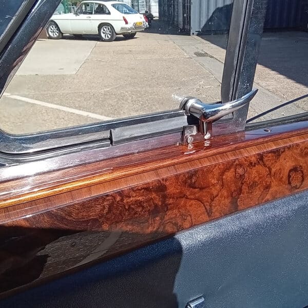 230426 1959 Jaguar MkIX OF Quarter Window Striker