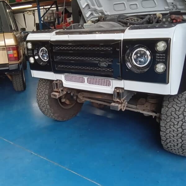 300526 2008 Land Rover Defender Pickup Front Bumper Winch and Wiring Removal 2