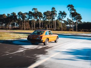 1975 MGB GT V8 - Orange - in motion-6